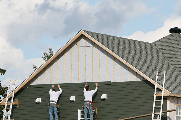 Professional Siding technician working in McDonough, GA